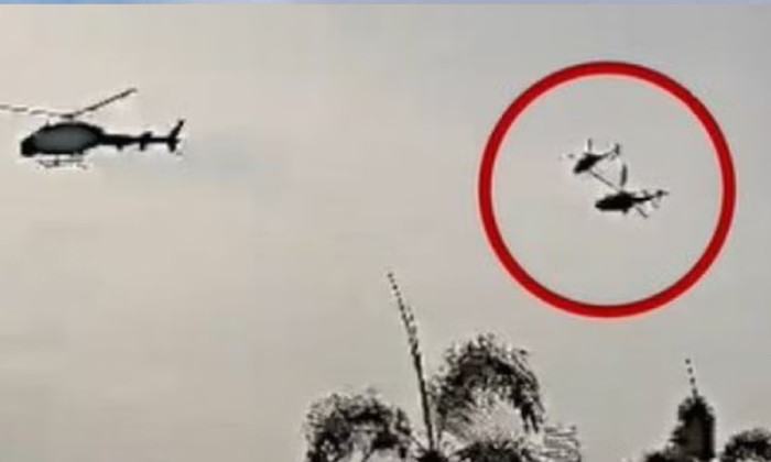 মাঝ আকাশে দুই হেলিকপ্টারের সংঘর্ষে নিহত ৫ মাঝ আকাশে দুই হেলিকপ্টারের সংঘর্ষে নিহত ৫